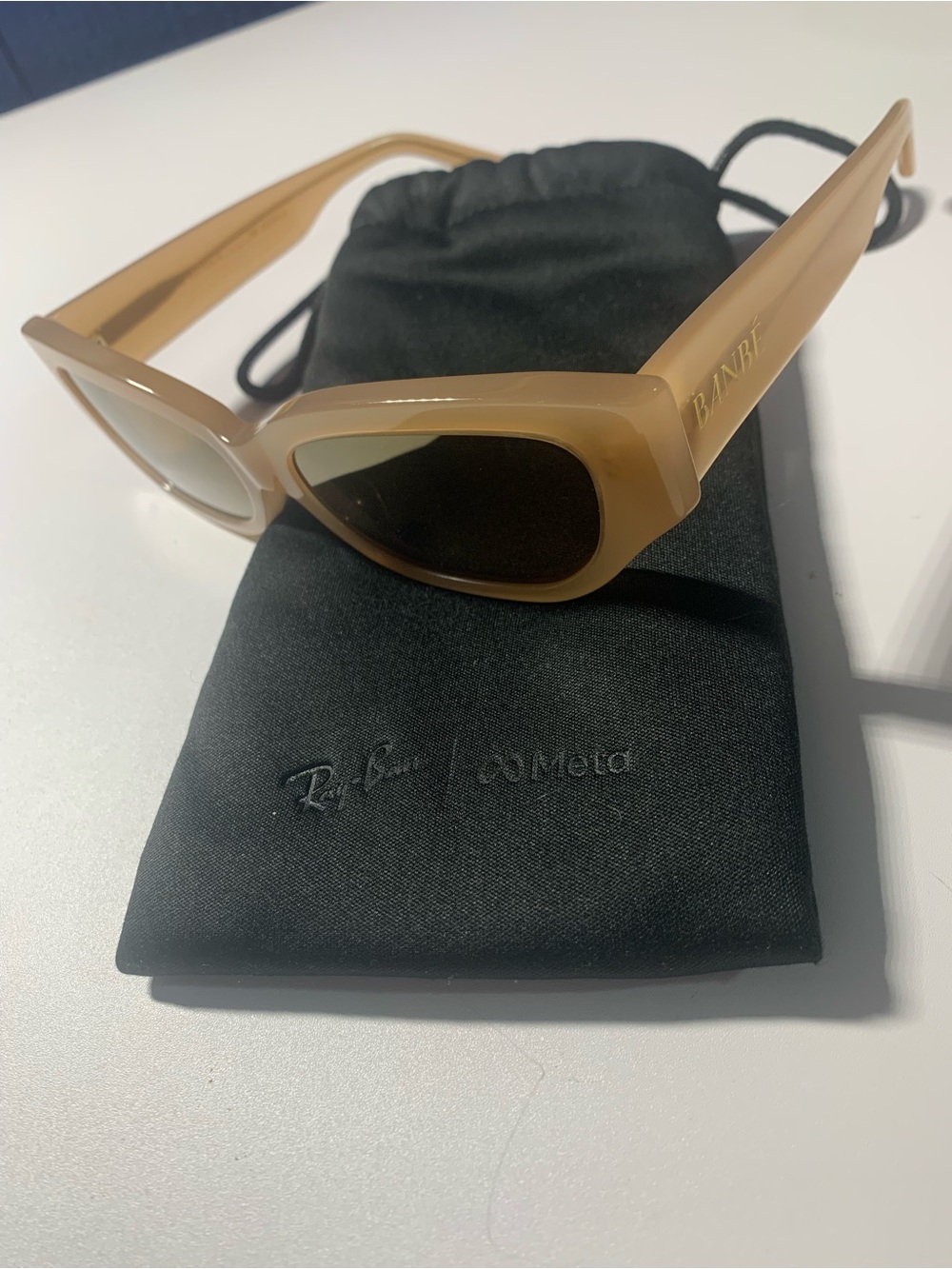 BANBE Women's Beige Sunglasses — Chic Neutral Frame with Ray-Ban carrying case.